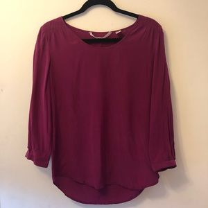 Silk top with 3/4 sleeve and high low hem